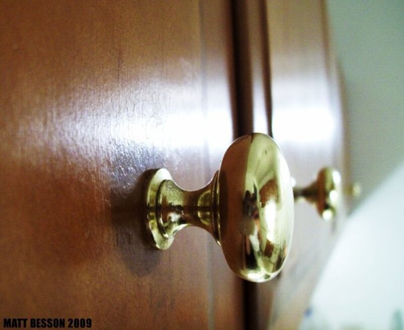 close-up of a brass drawer knob