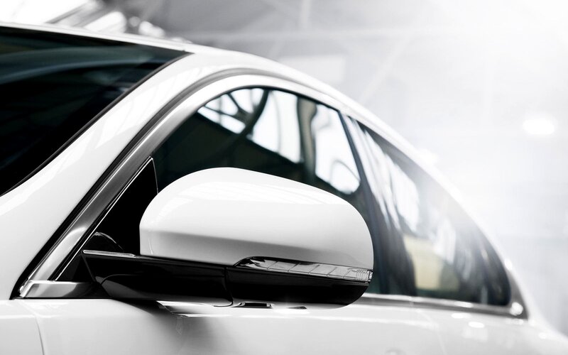 Close-up of a car's side mirror