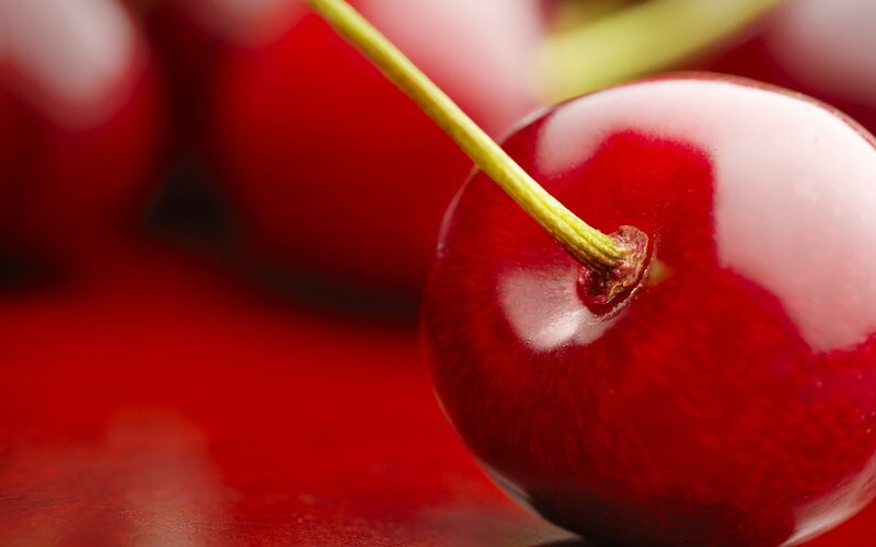 Close-up of a Cherry — Red, Vibrant