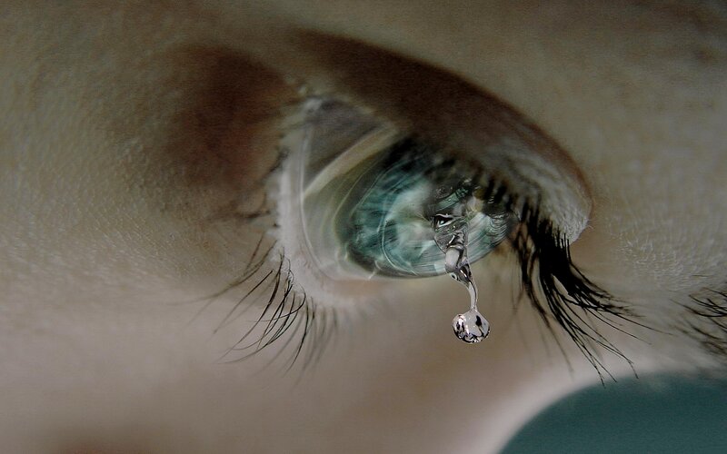 close-up of a crying eye