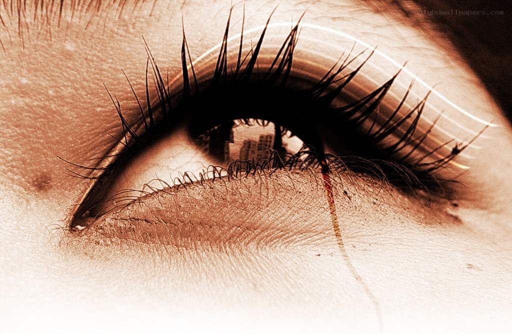 Close-up of a crying eye