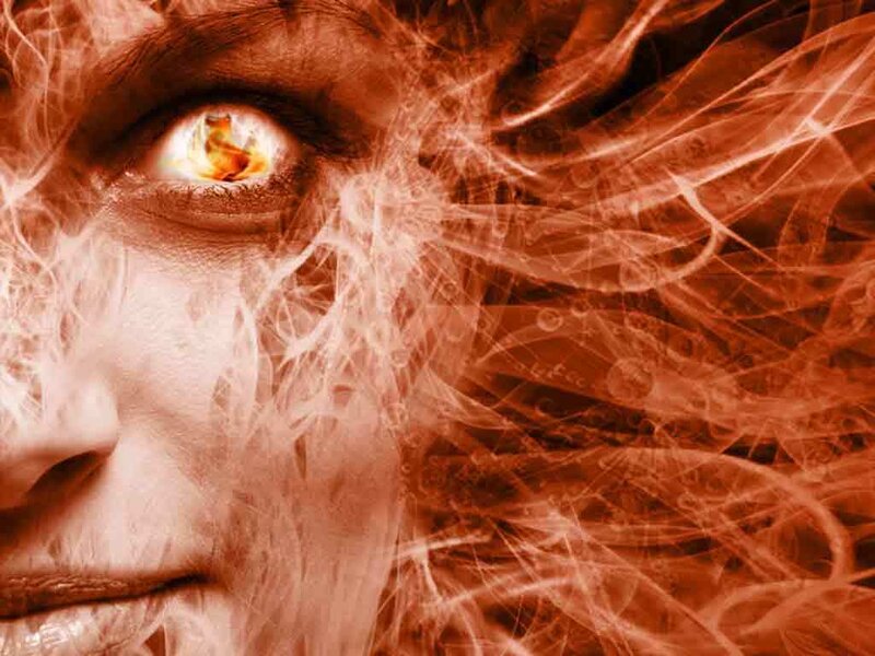 close-up of a face with glowing eye