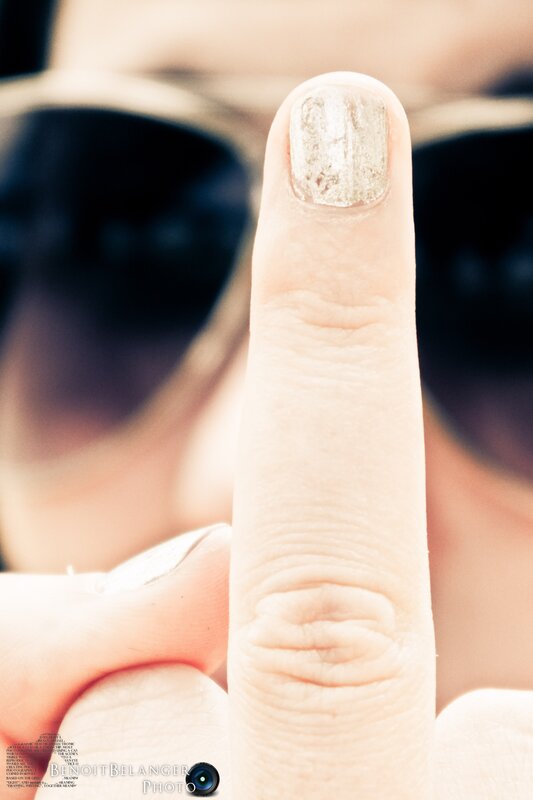 close-up of a finger with nail polish