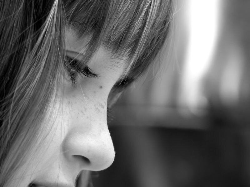 Close-up of a Girl's Face — Black, Contemplative