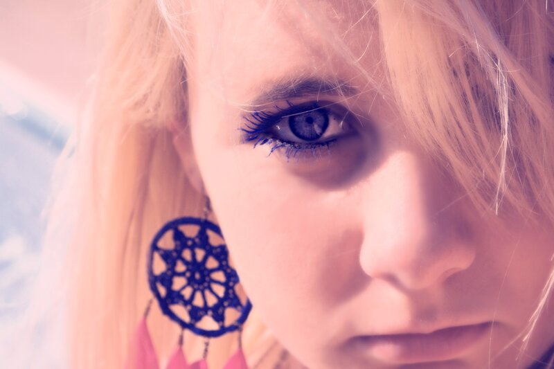 close-up of a girl with blue eyes