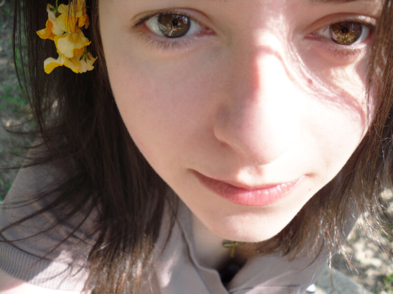 close-up of a girl with flowers