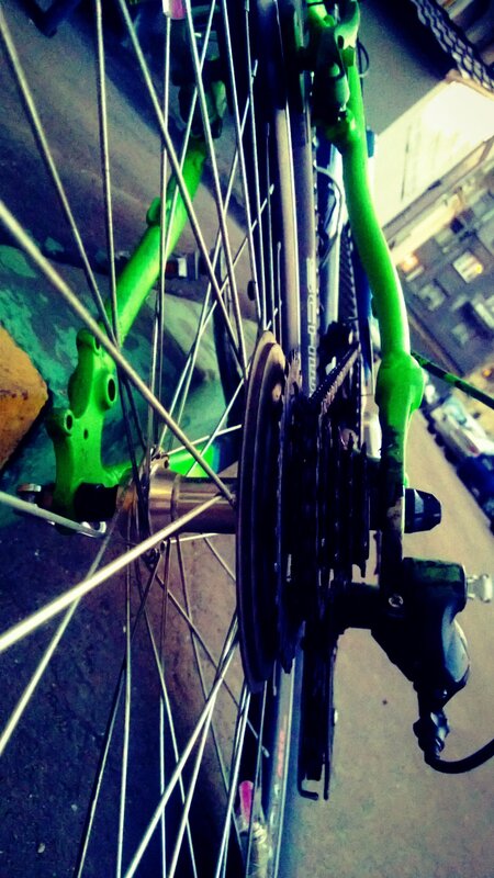 close-up of a green bicycle