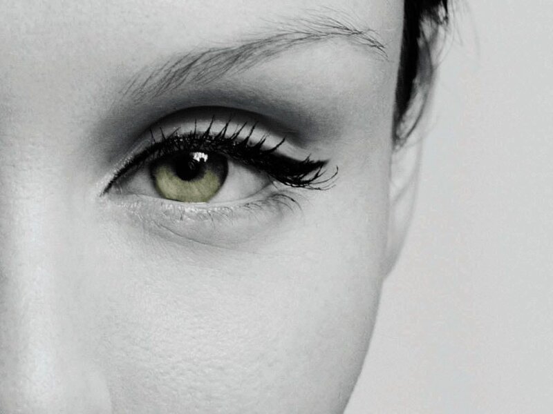 Close-up of a Green Eye — White, Dramatic
