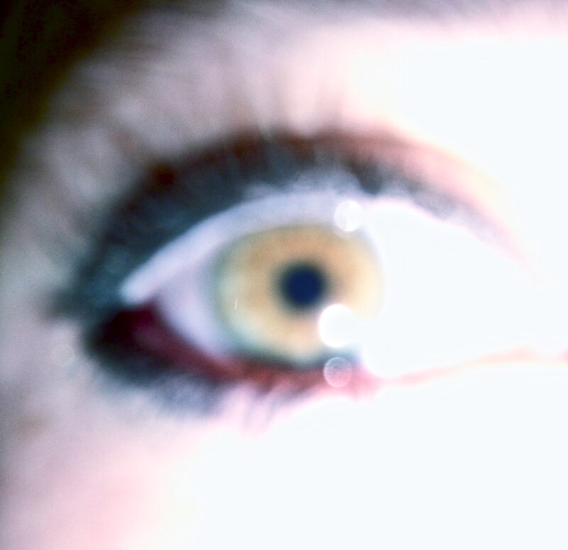 Close-up of a Human Eye — White, Blurry
