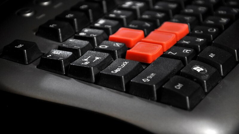 Close-up of a keyboard with red keys