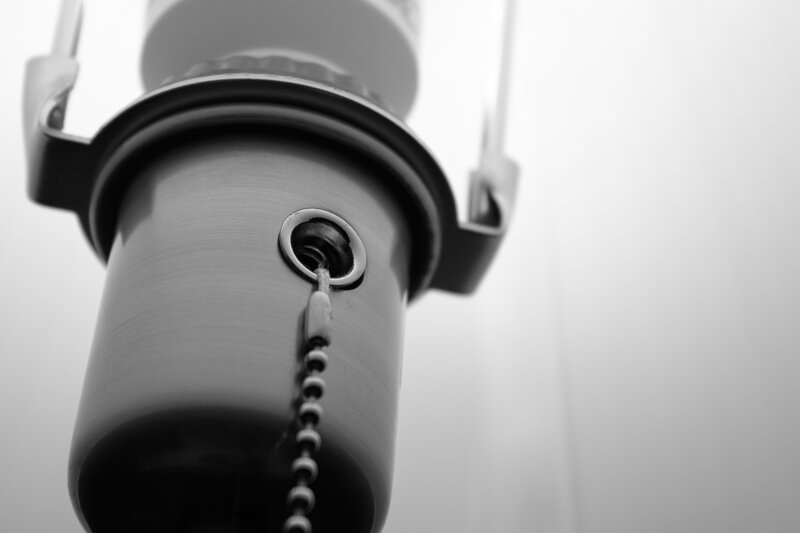 close-up of a lamp pull chain