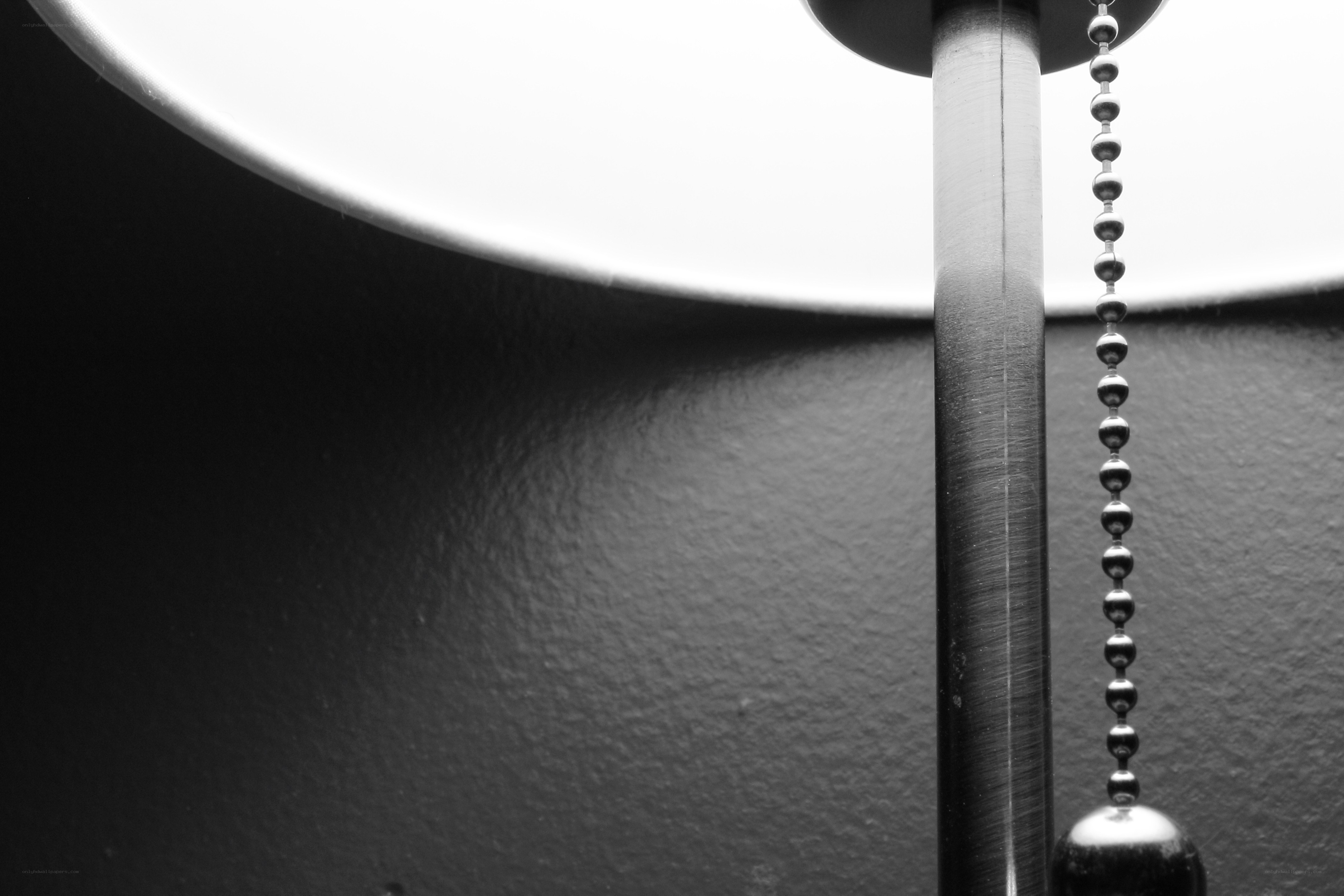 Close-up of a lamp pull chain