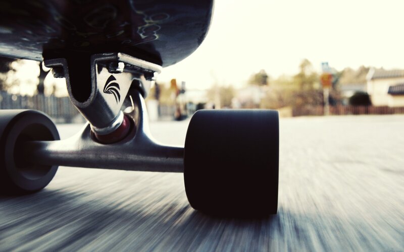 close-up of a longboard in motion