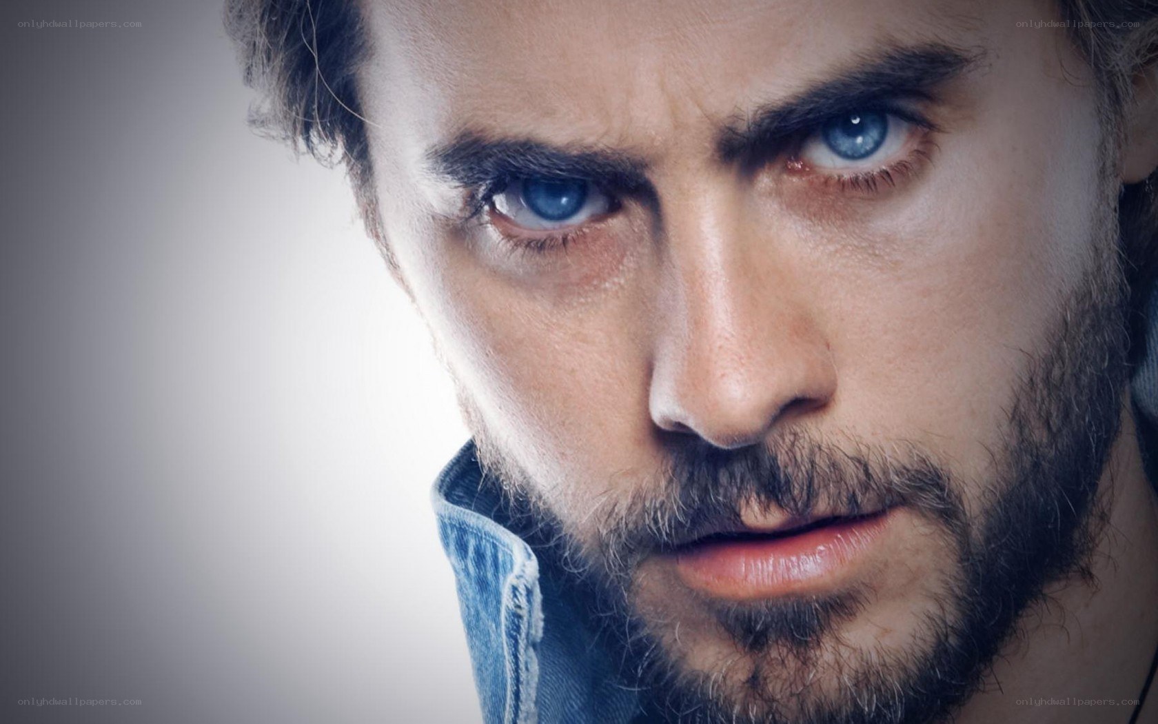 close-up of a man with blue eyes