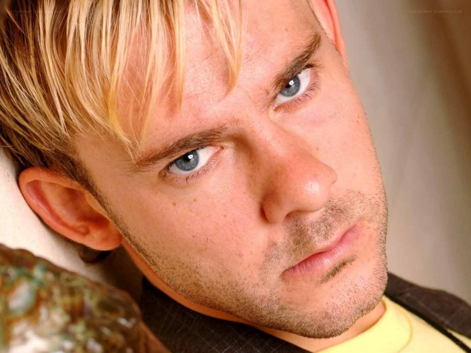 close-up of a man with blue eyes