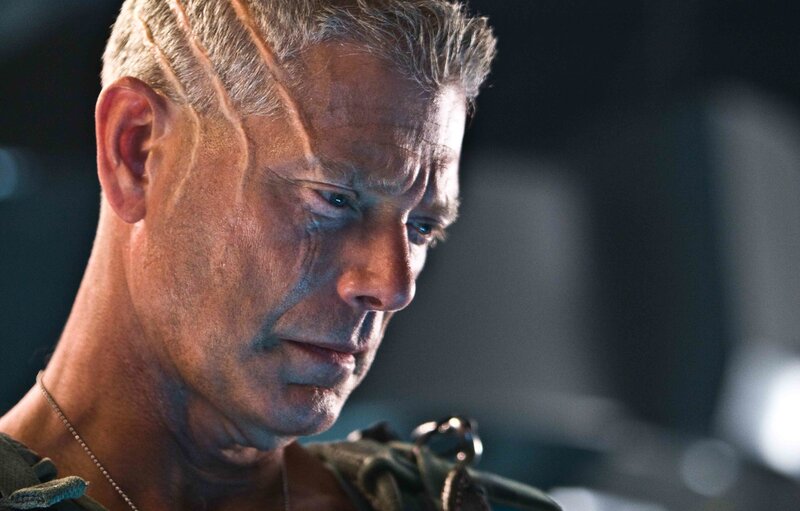 close-up of a man with scars