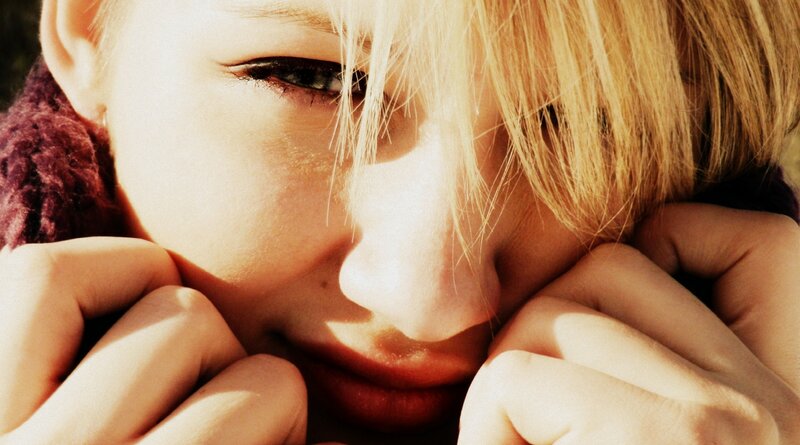 close-up of a person with blonde hair