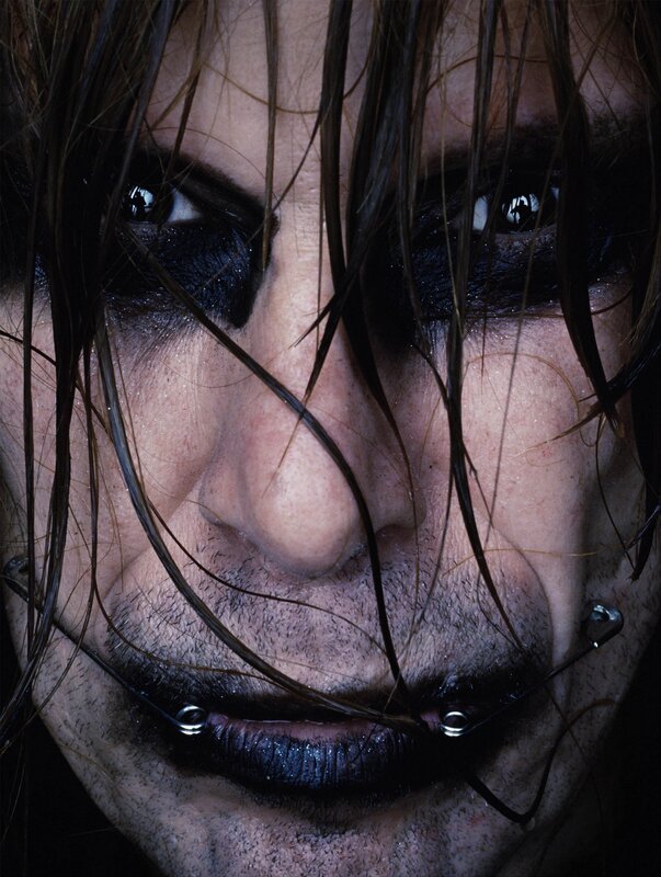 close-up of a person with dark makeup