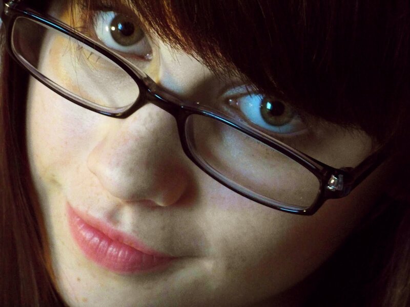 close-up of a person with glasses