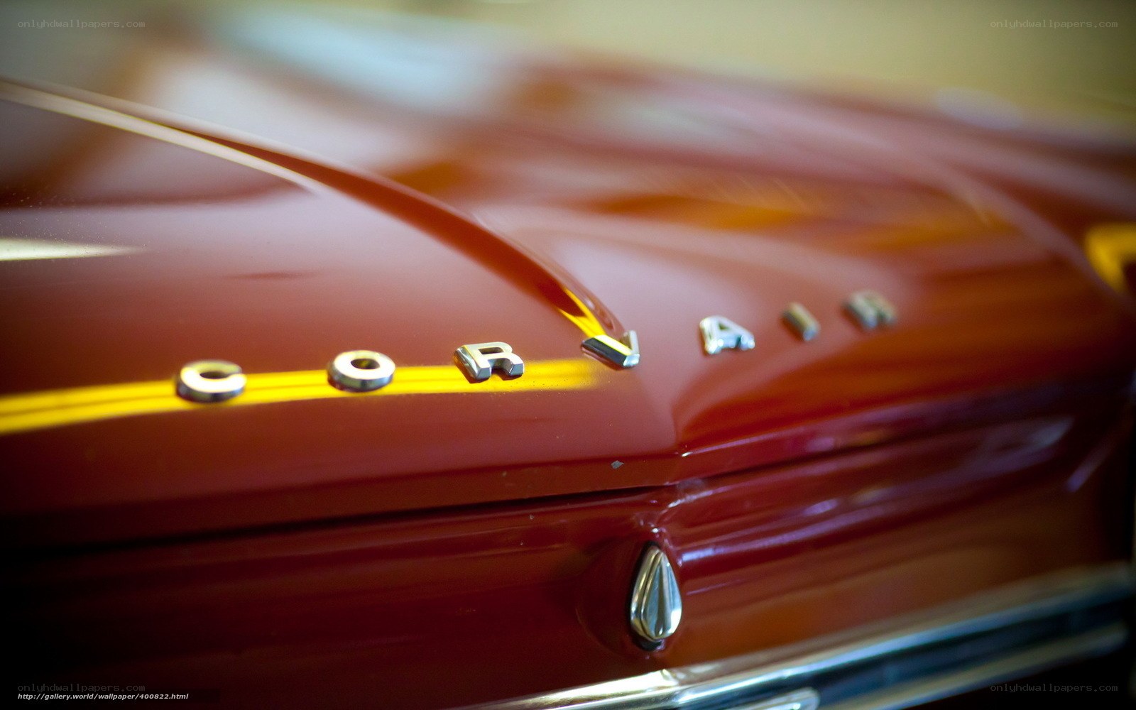 Close-up of a red car emblem