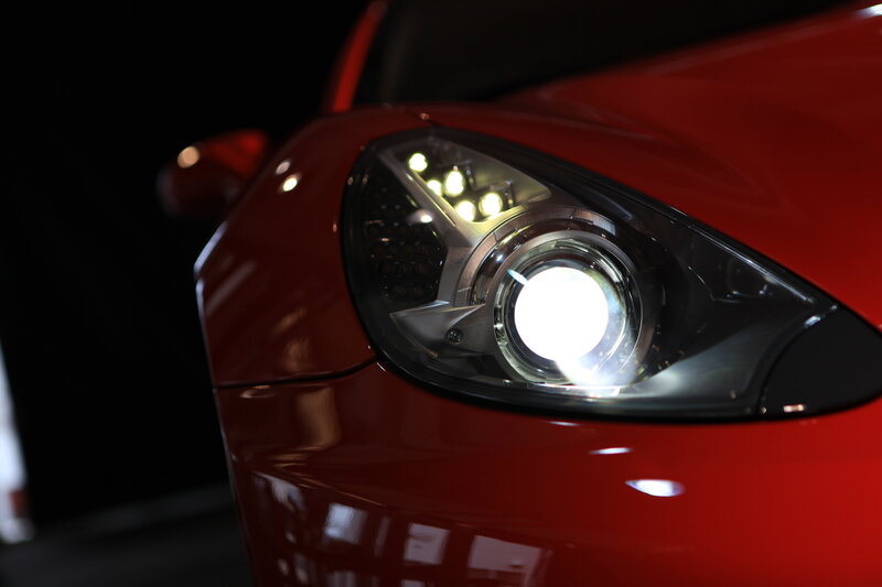 Close-up of a red car headlight