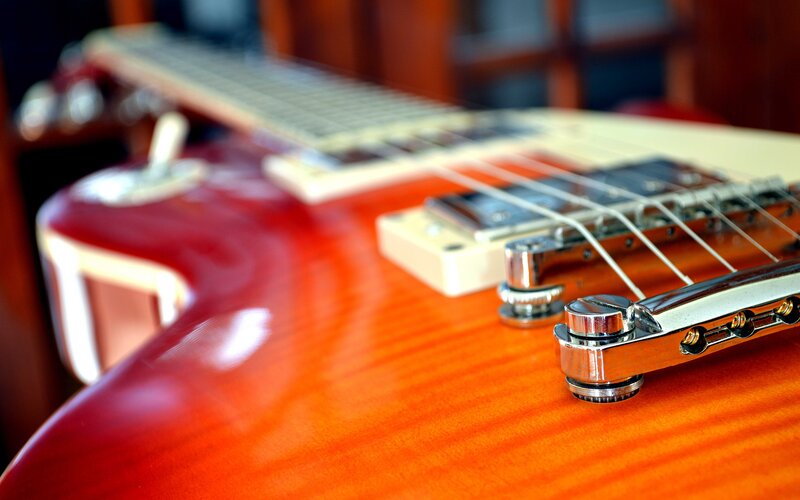 Close-up of a red electric guitar