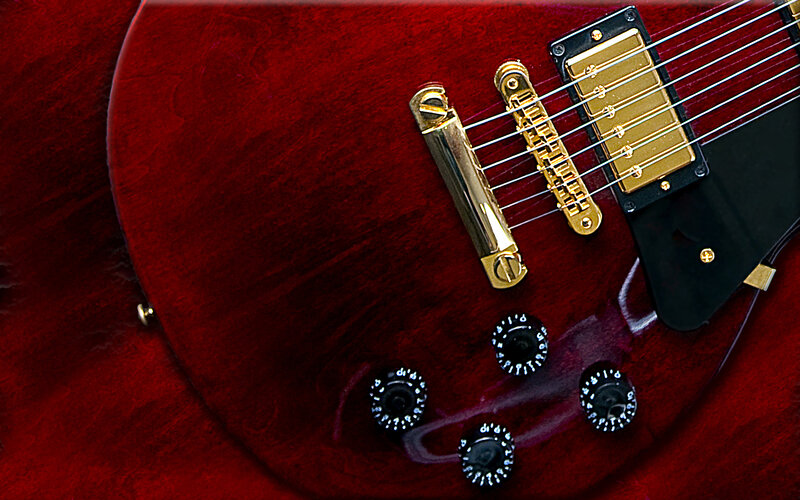 close-up of a red electric guitar