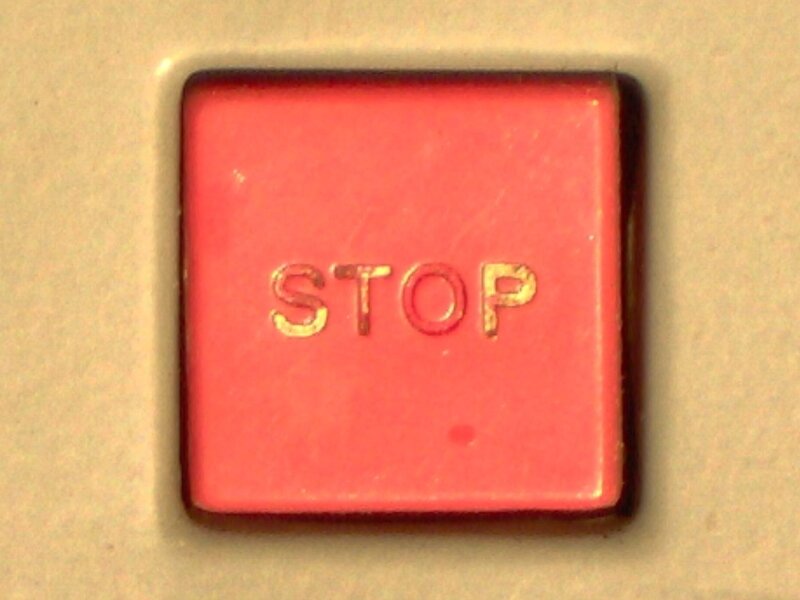 close-up of a red stop button