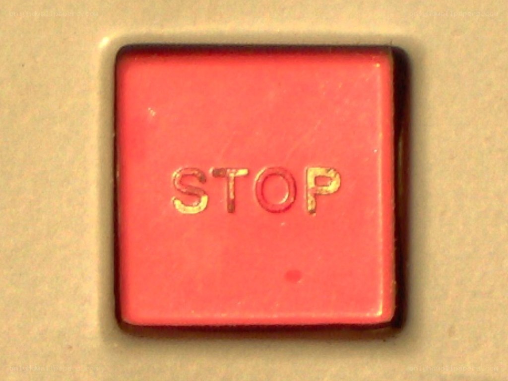 close-up of a red stop button