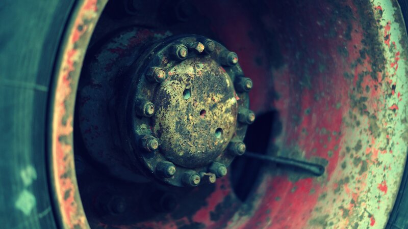 close-up of a rusty wheel hub