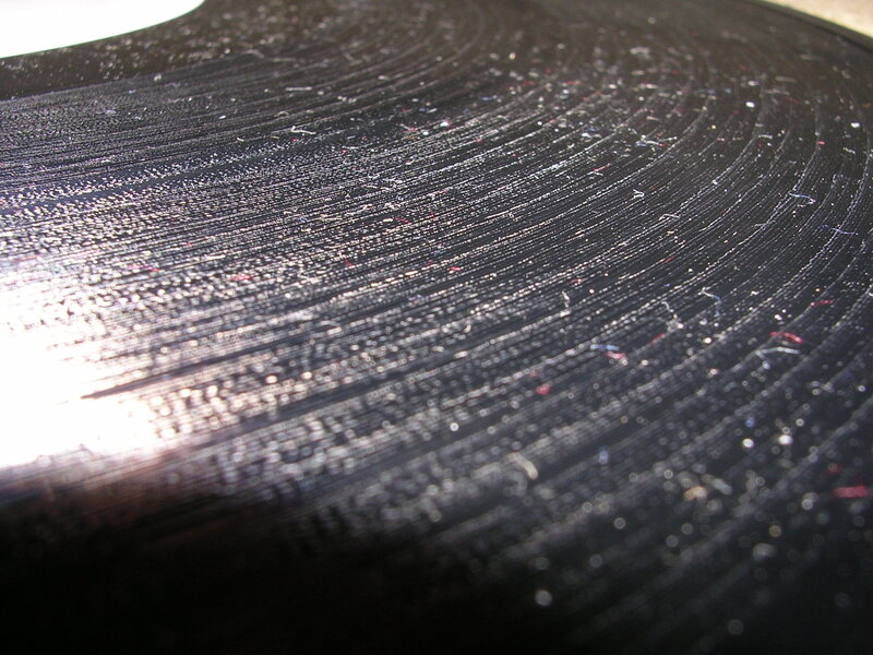 close-up of a scratched vinyl record