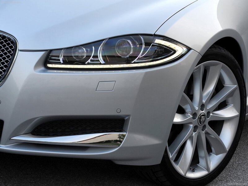 Close-up of a silver Jaguar car