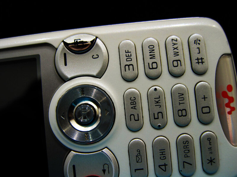 close-up of a silver phone keypad