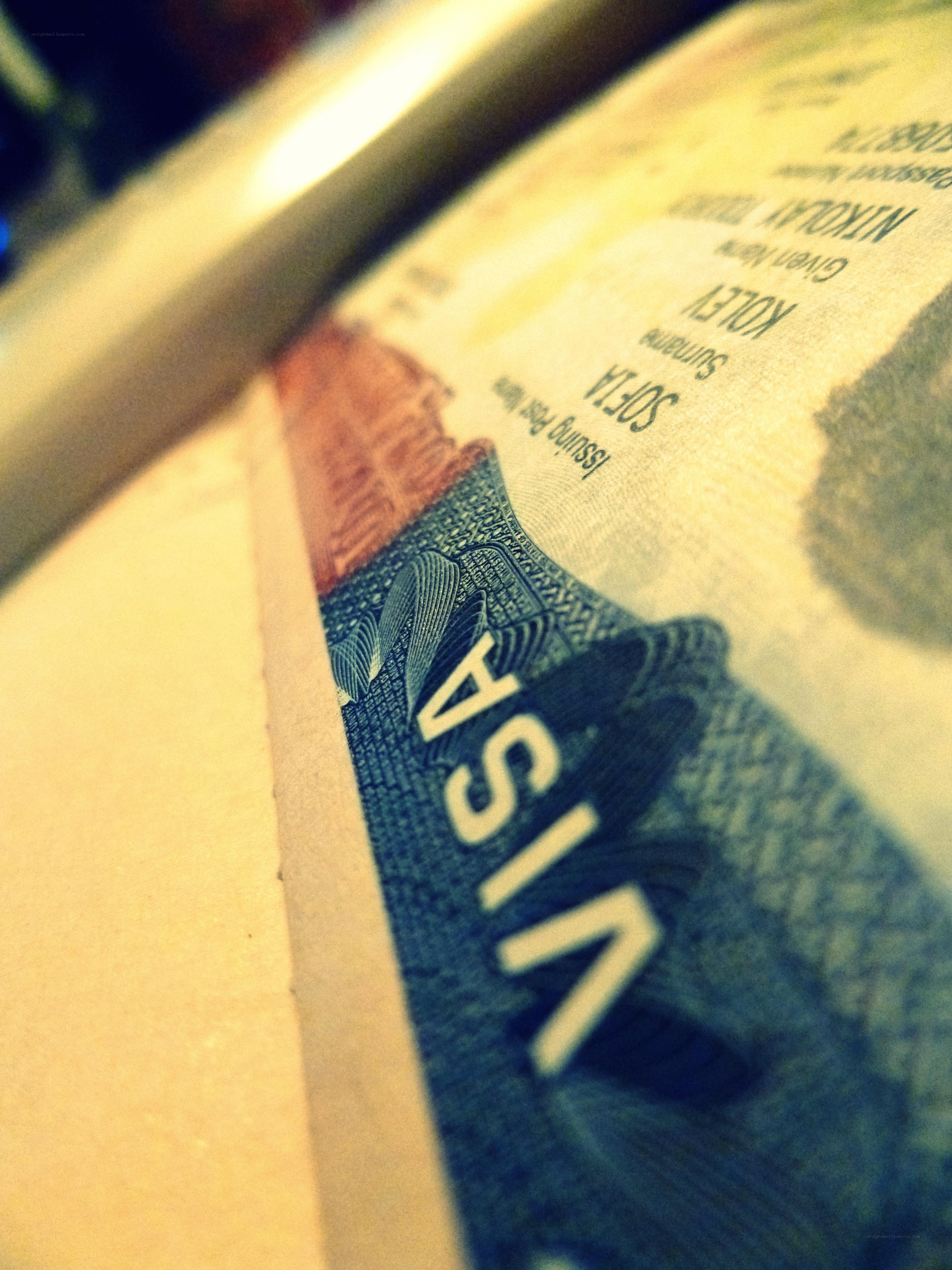 Close-up of a visa document