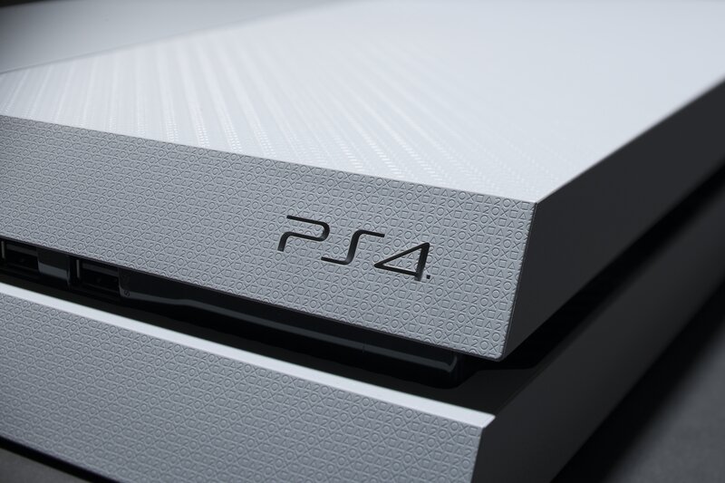 Close-up of a white PS4 console