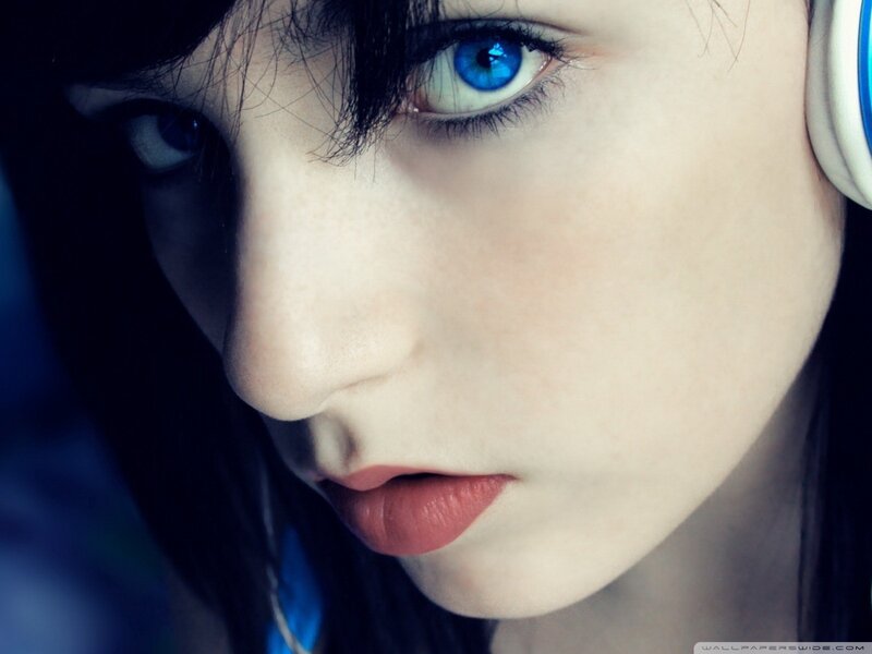 close-up of a woman with blue eyes