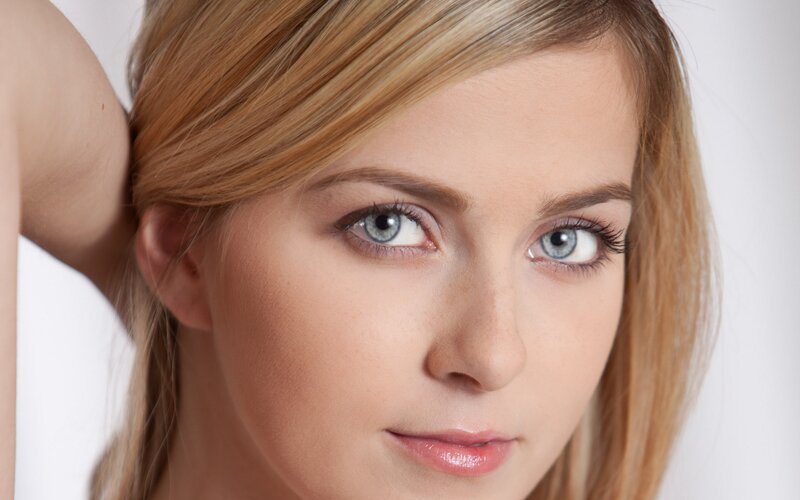 close-up of a woman with blue eyes