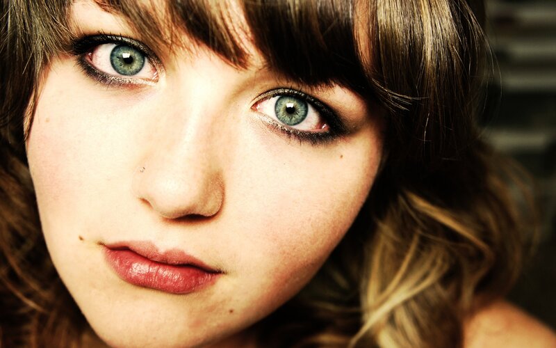 close-up of a woman with blue eyes