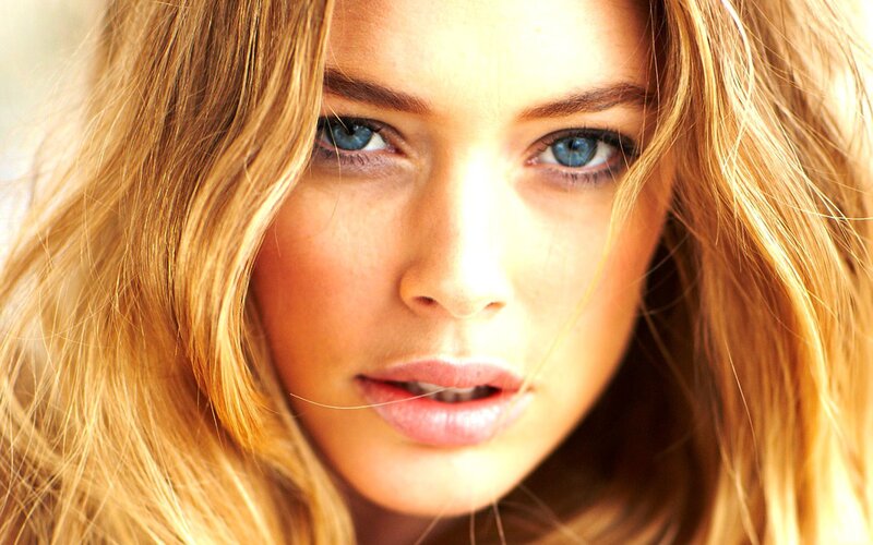 close-up of a woman with blue eyes