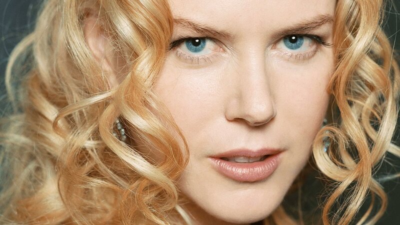 close-up of a woman with blue eyes