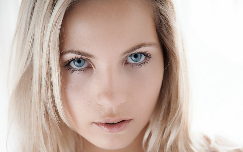 close-up of a woman with blue eyes