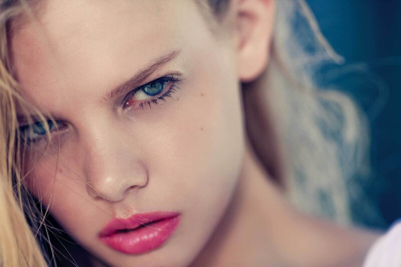 close-up of a woman with blue eyes