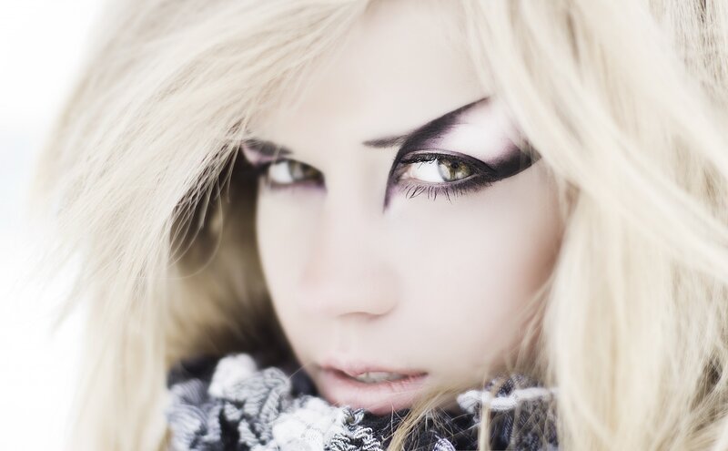 close-up of a woman with dramatic makeup