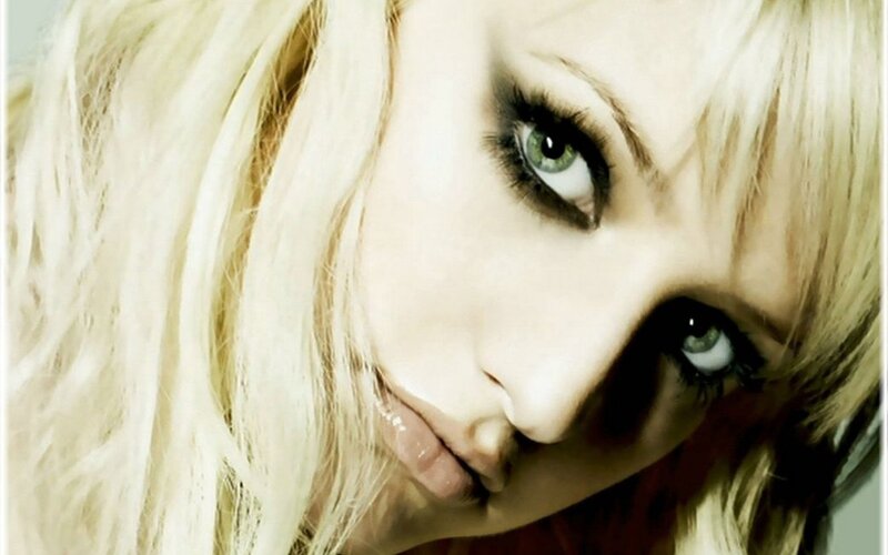 close-up of a woman with green eyes