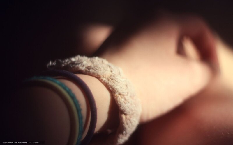 Close-up of a wrist with bracelets