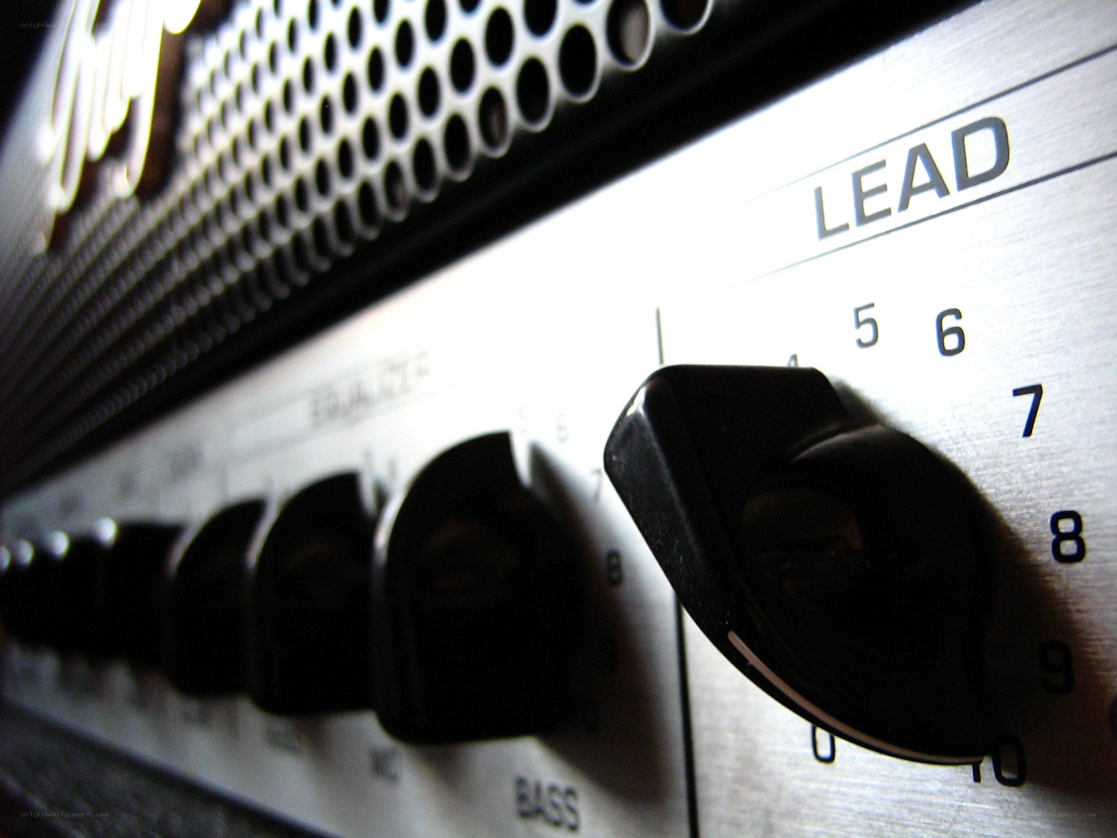 close-up of amplifier knobs