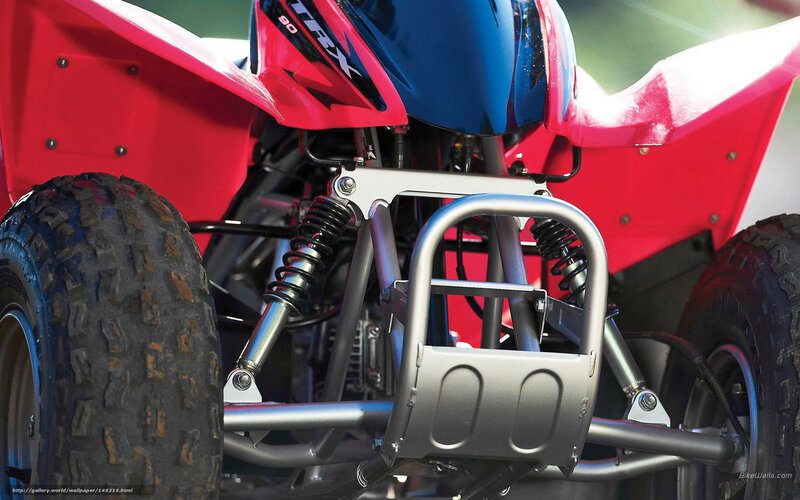 Close-up of ATV front suspension