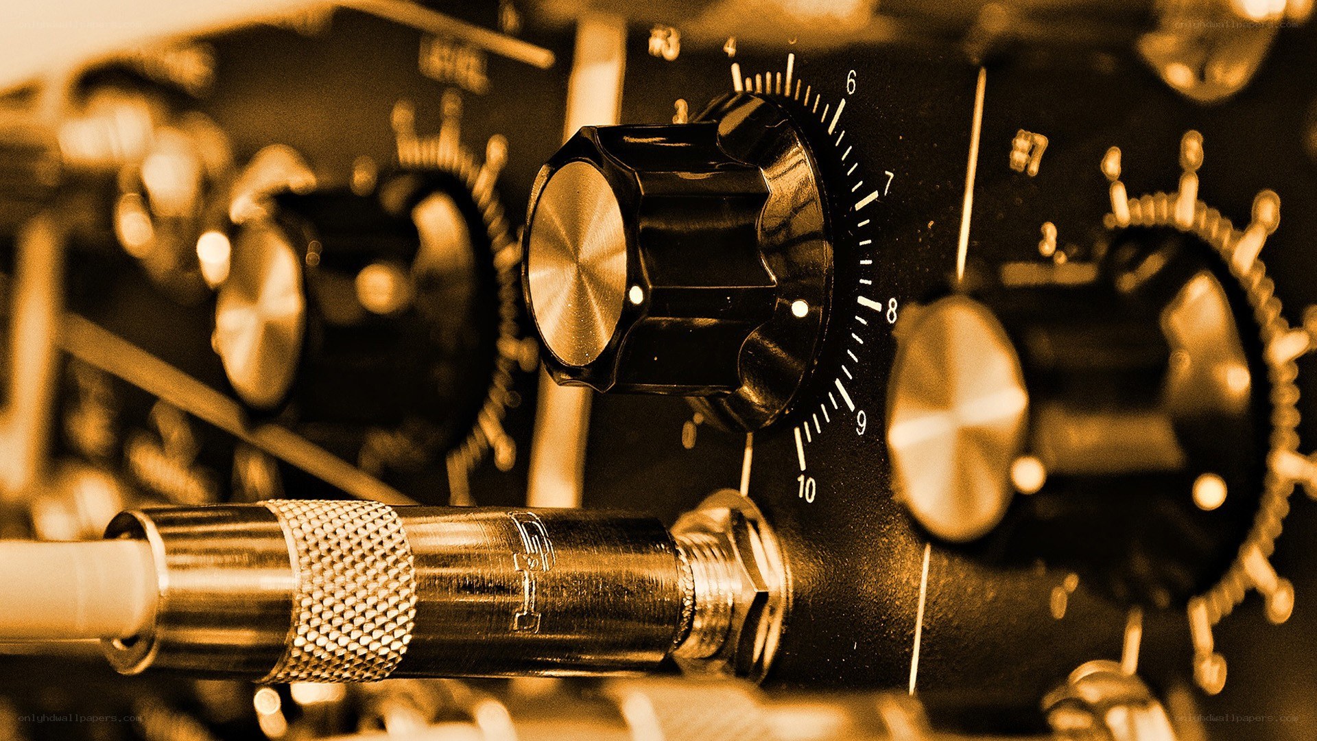 close-up of audio equipment knobs