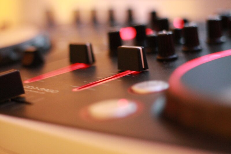 close-up of audio mixer controls