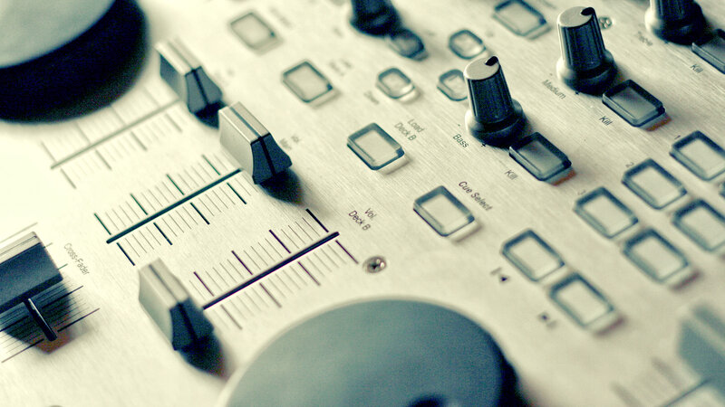 close-up of audio mixer controls